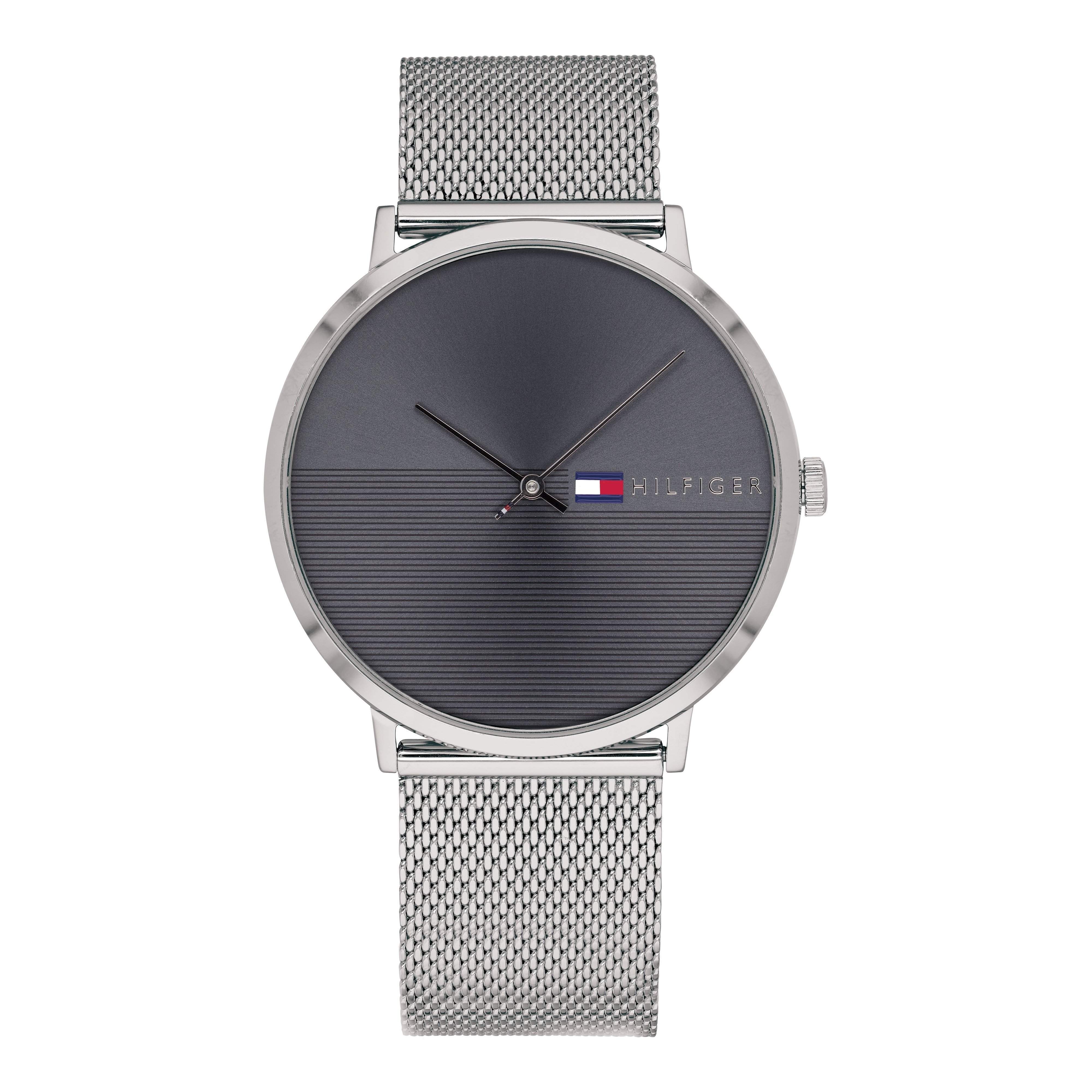 Tommy Hilfiger men's watch with dark dial, silver mesh strap, and three-hand movement
