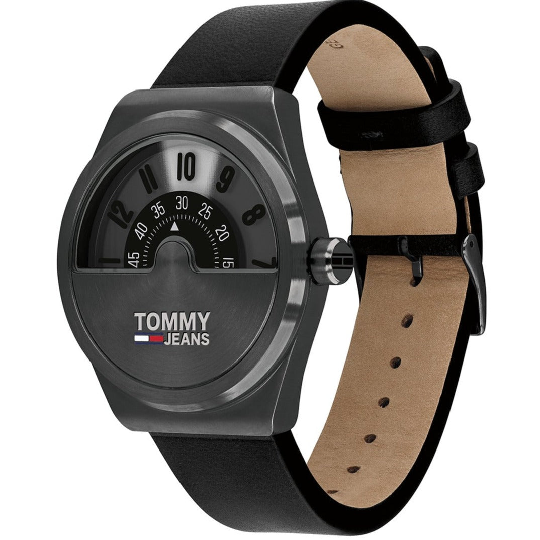 Tommy Hilfiger Monogram Pop watch at angle showing black strap and tan leather lining