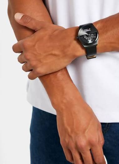 Tommy Hilfiger Monogram Pop men's watch worn on wrist with black leather strap