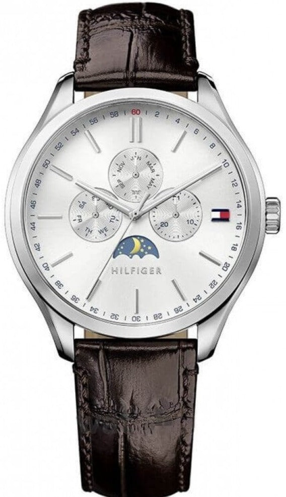 Tommy Hilfiger Oliver men's watch with white multifunction dial, silver case, moon phase indicator, and brown leather strap