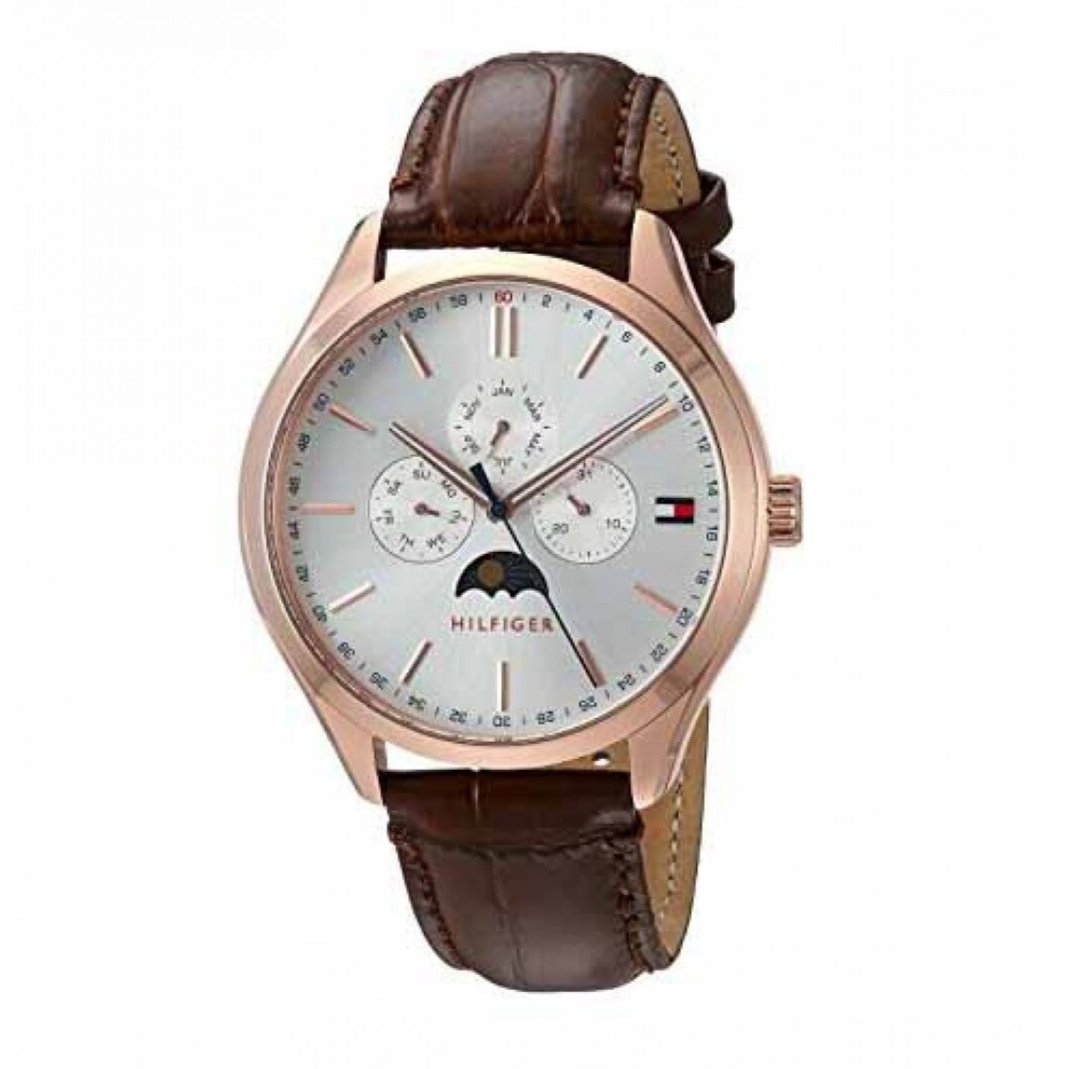 Tommy Hilfiger Oliver men's watch displaying white dial with rose gold indices and brown crocodile leather strap