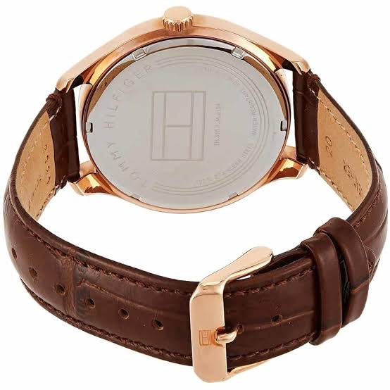 Case back of Tommy Hilfiger Oliver watch showing rose gold metal back with engraved Tommy Hilfiger branding