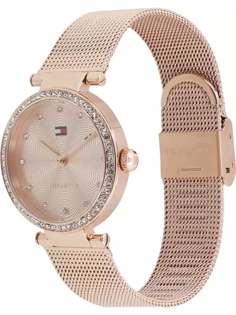 Side angle view of Tommy Hilfiger rose gold watch with mesh band and crystal-set case