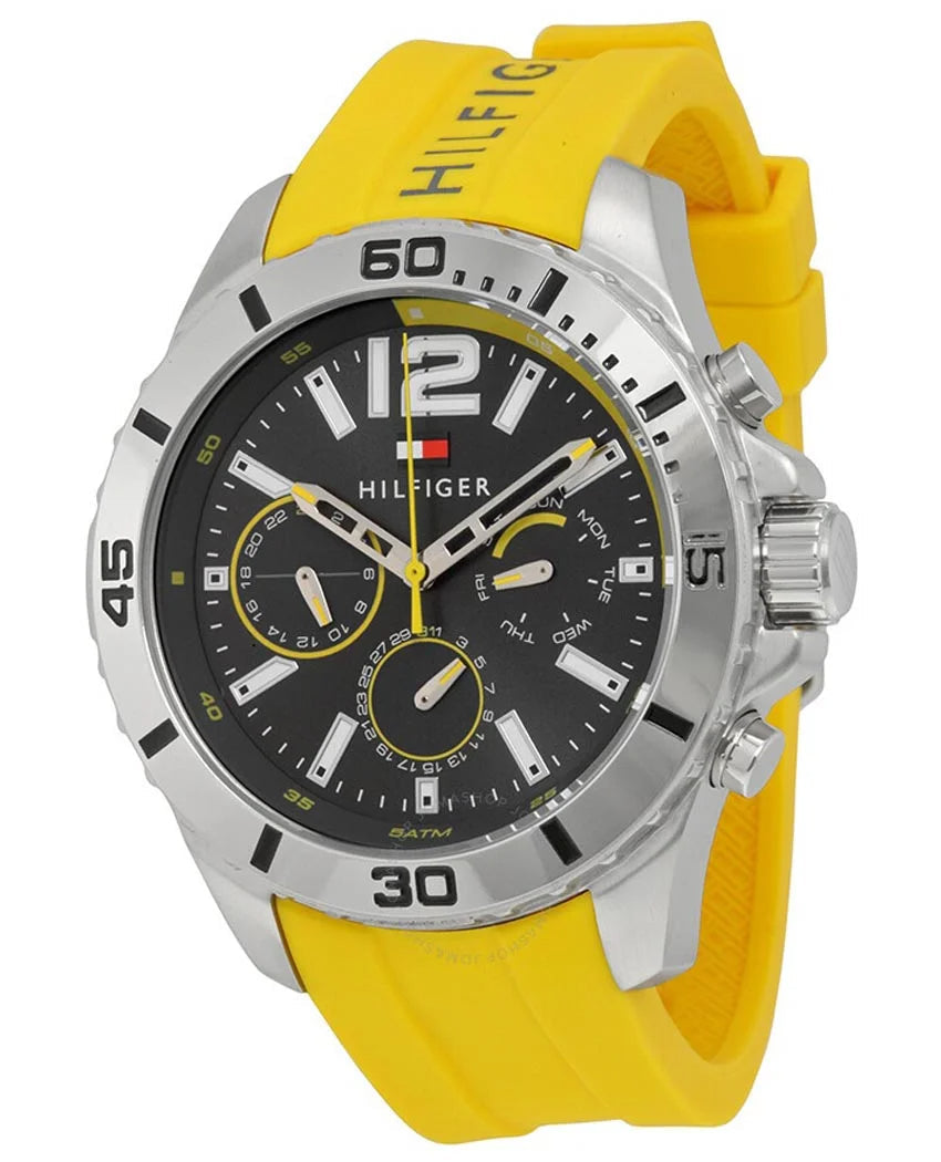 Three-quarter view of Tommy Hilfiger Shawn chronograph watch with yellow strap and steel case