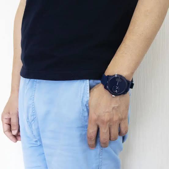 Tommy Hilfiger Sport blue dial men's watch worn on wrist