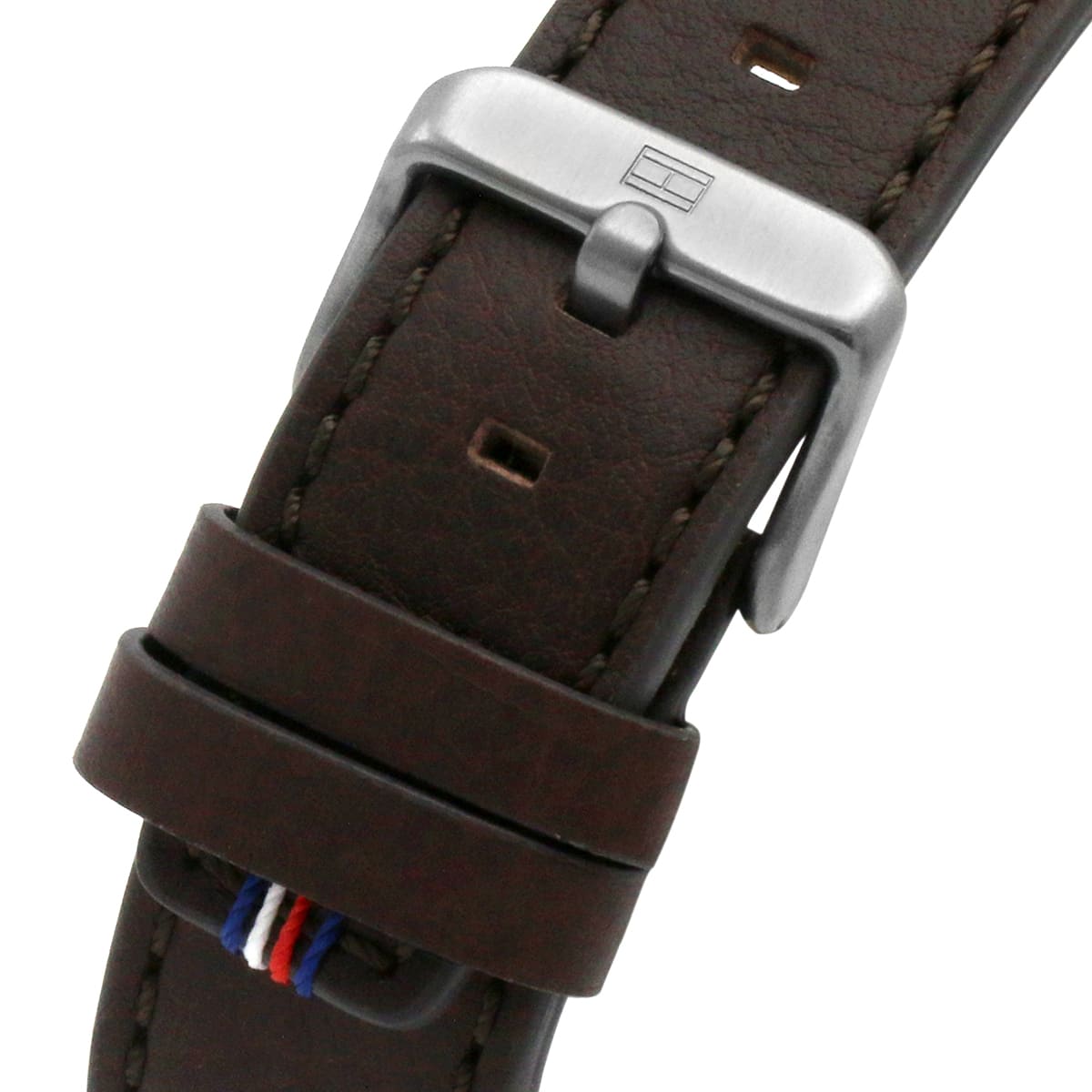 Brown leather strap with Tommy Hilfiger buckle and red-white-blue flag detail
