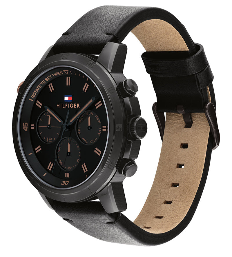 Side view of Tommy Hilfiger Troy watch showing black leather strap and chronograph case