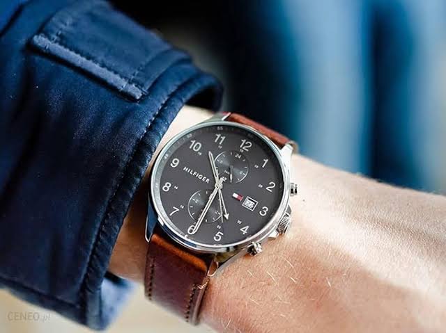 Tommy Hilfiger West men's chronograph watch worn on wrist with brown leather strap