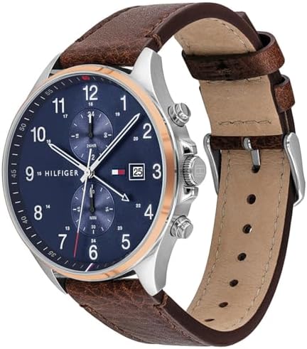 Side angle view of Tommy Hilfiger West watch showing brown leather strap and dial