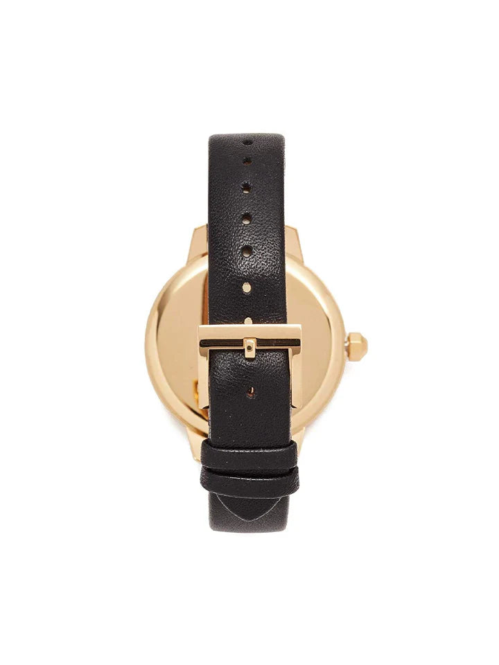 Back view of Tory Burch Collins watch showing caseback and black leather strap
