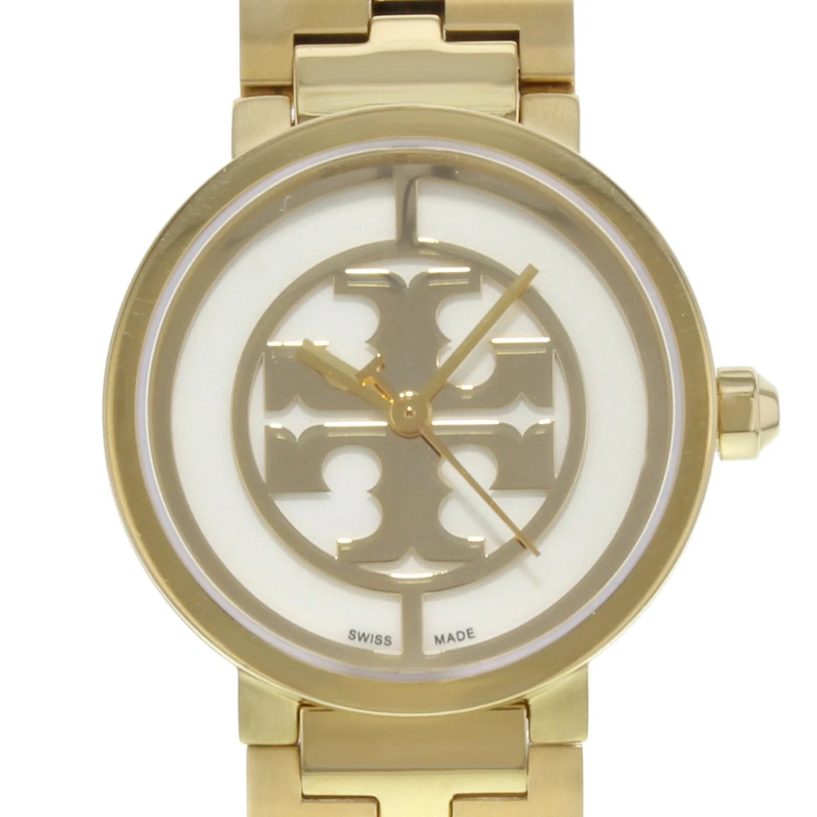 Close-up of Tory Burch Reva dial showing small logo design and Swiss made marking