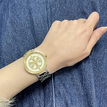Tory Burch The Reva watch on wrist showcasing fit and dual-tone design