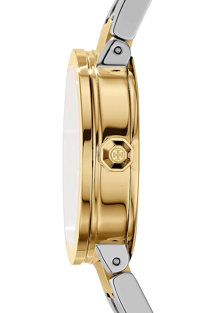 Side profile of Tory Burch The Reva watch showing case depth and dual-tone bracelet links