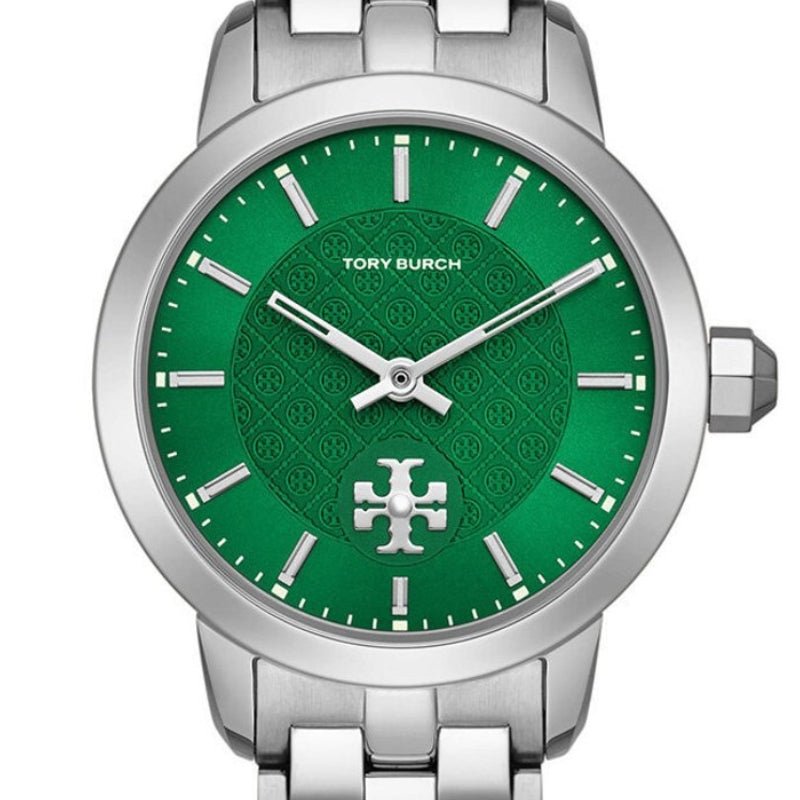 Close-up of Tory Burch TBW1054 green dial with patterned surface and white hour markers
