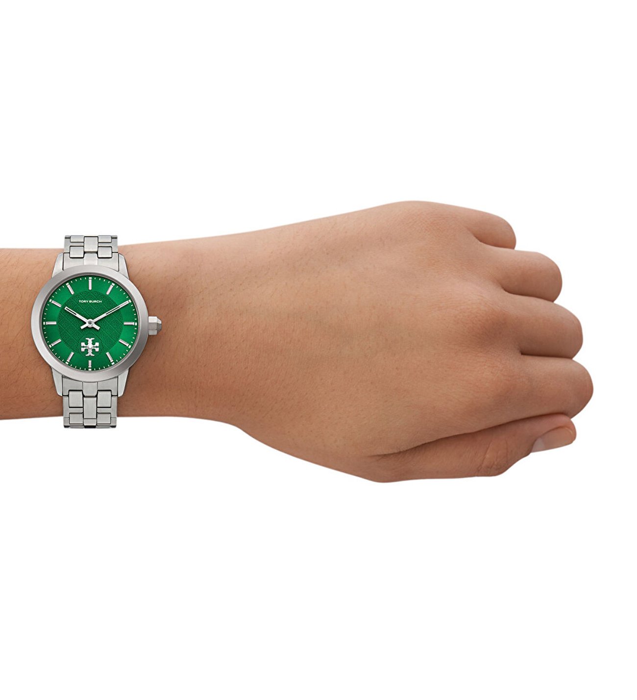 Tory Burch TBW1054 green dial watch worn on wrist with silver steel bracelet