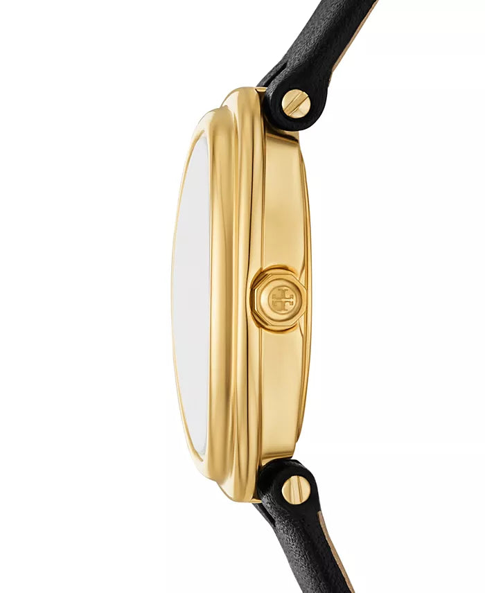 Side view of Tory Burch oval watch showing gold tone case profile and black leather strap