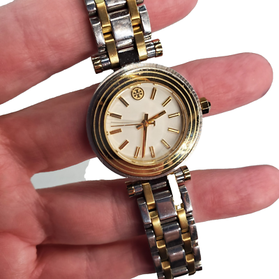 Tory Burch Classic T two-tone watch worn on wrist showing dial and bracelet detail