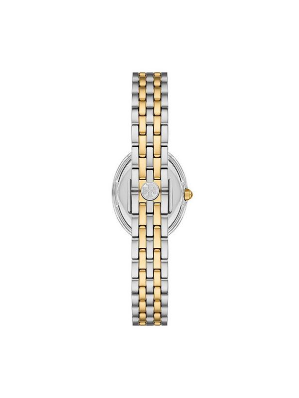 Angled view of Tory Burch The Oval two-tone bracelet watch with oval case detail