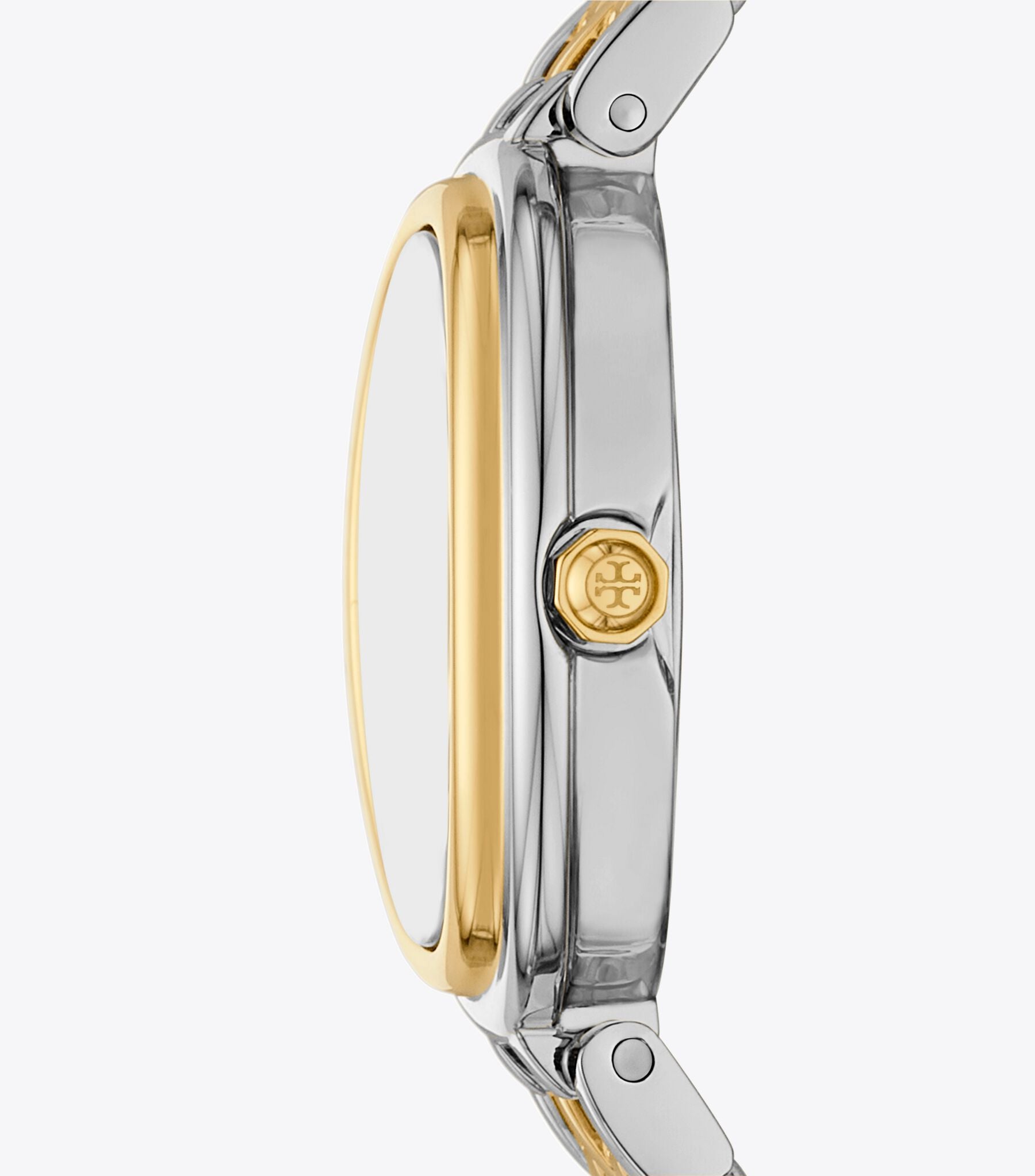Side view of Tory Burch The Oval watch showing two-tone stainless steel case and bracelet profile