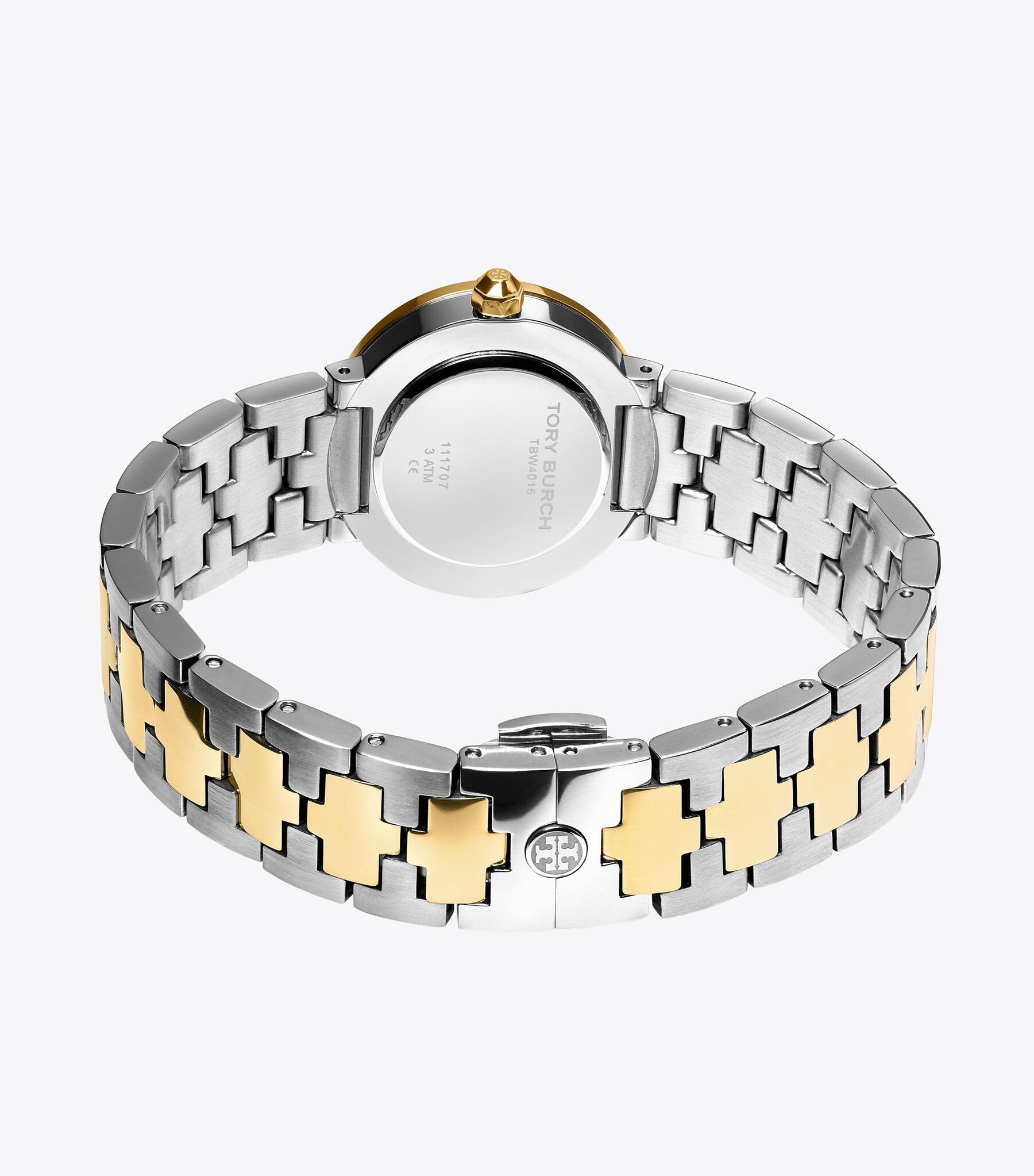 Tory Burch The Reva watch on wrist showing dual-tone bracelet with gold accents
