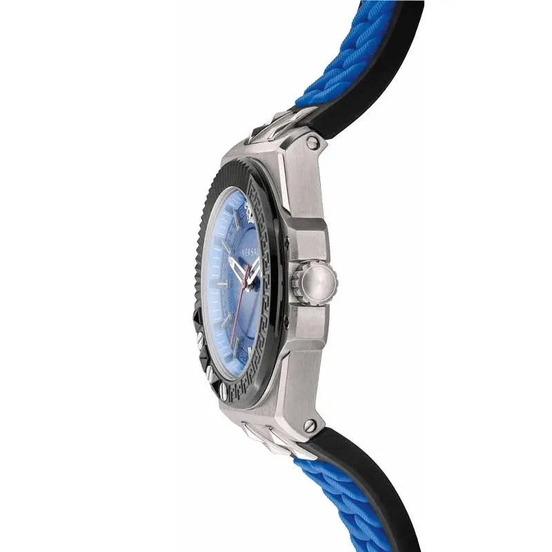 Angled view of watch case, blue dial, and rubber strap