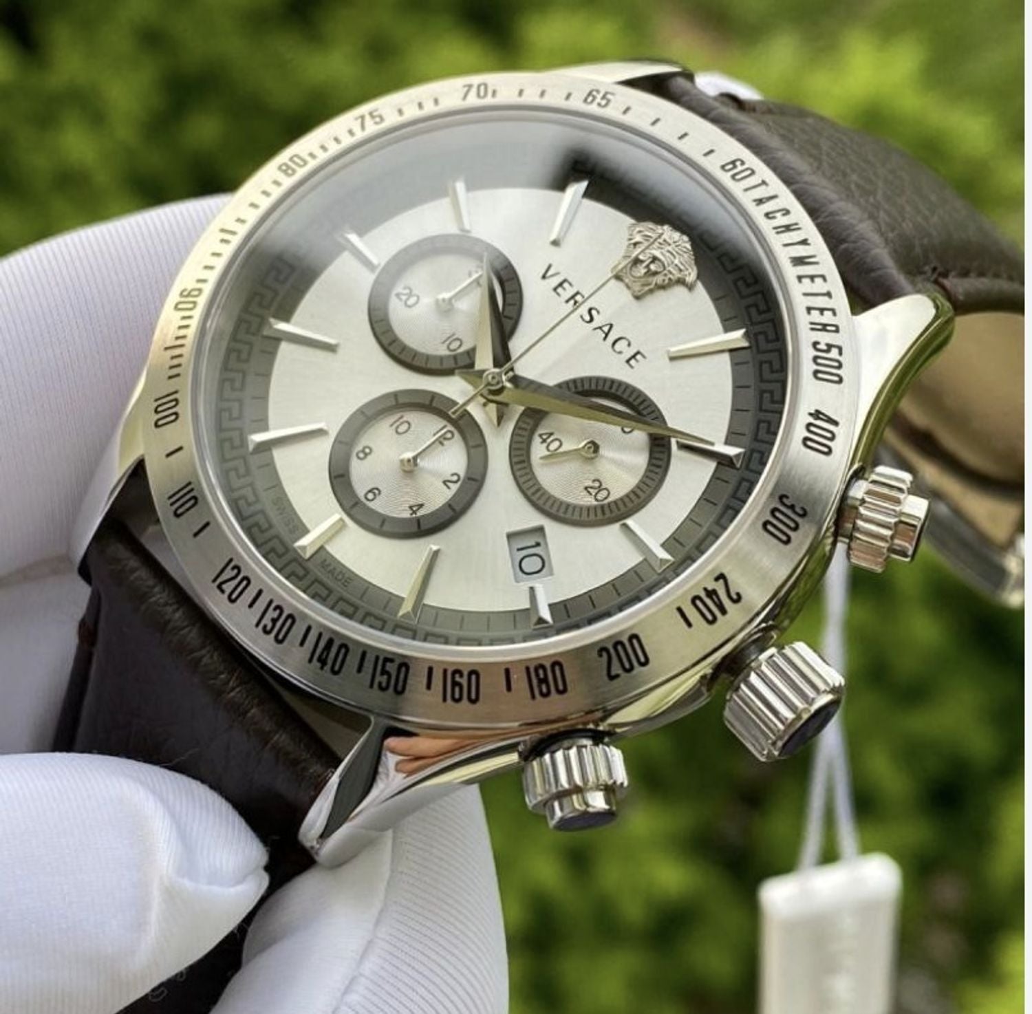 Close-up of Versace Classic Chronograph dial showing three subdials and Versace logo