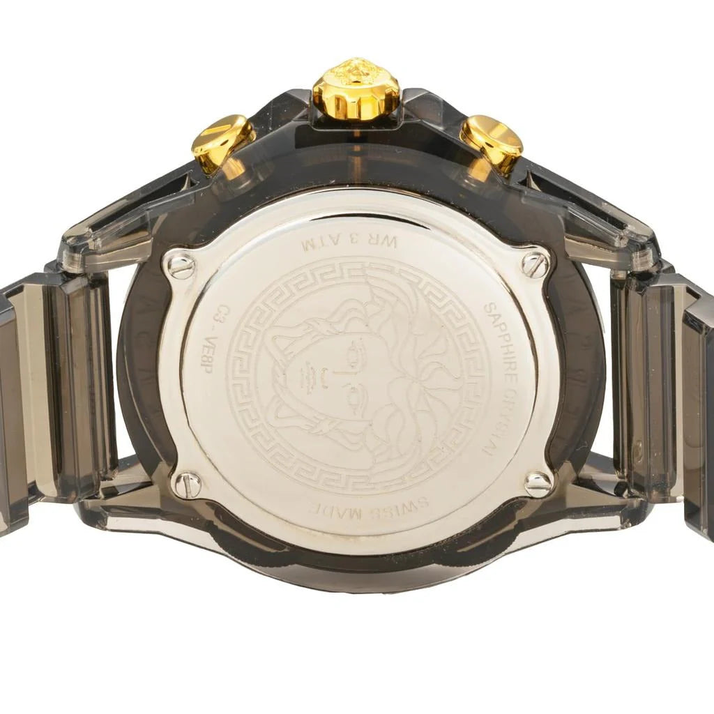 Watch caseback showing white dial with Medusa Gorgoneion profile, Greek key pattern and Versace engraving