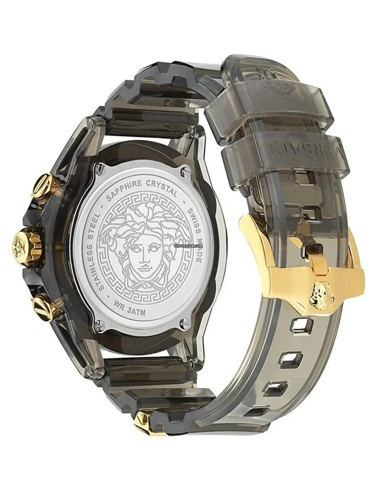 Sapphire crystal caseback showing white dial with Medusa head and Versace branding on black rubber strap