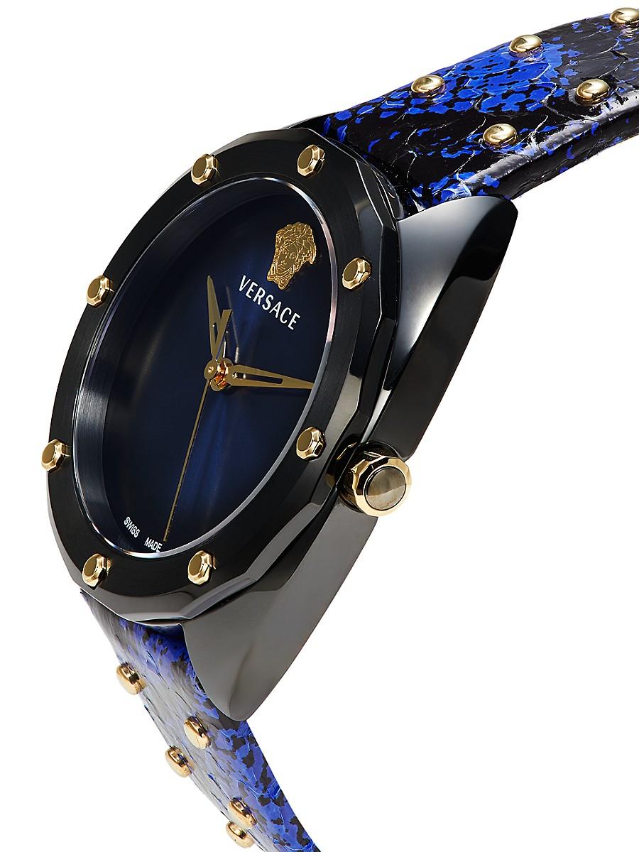 Versace Shadov watch side profile with blue embossed leather strap and gold crown