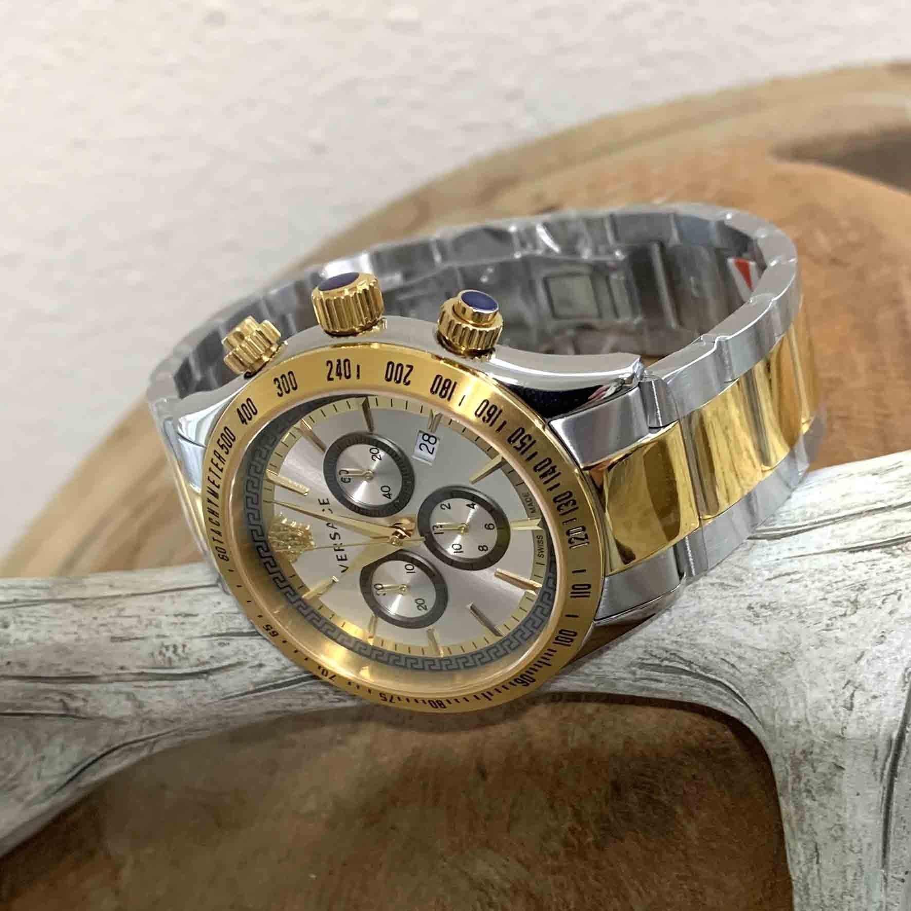 Versace chronograph watch displayed at three-quarter angle showing two-tone case and bracelet