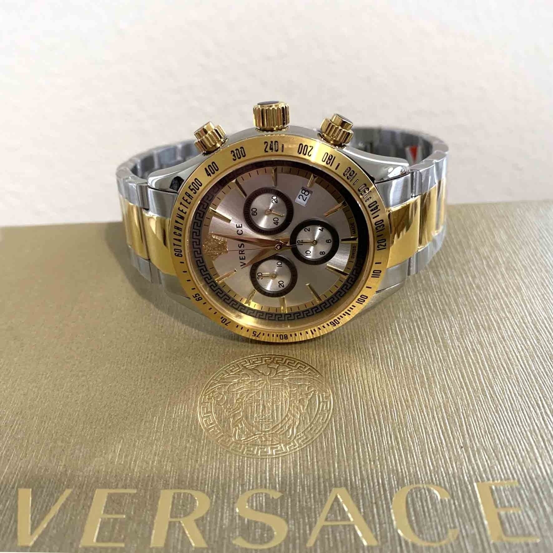 Versace chronograph watch displayed on Versace branded box with Medusa motif