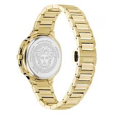 Versace V-Code watch caseback showing Medusa medallion on transparent exhibition back with gold tone bracelet
