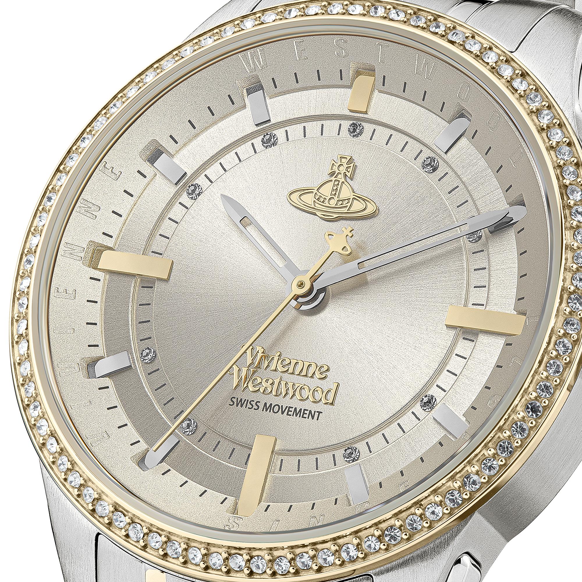Close-up of Vivienne Westwood East End dial featuring gold-tone markers, Westwood branding and Swiss movement text