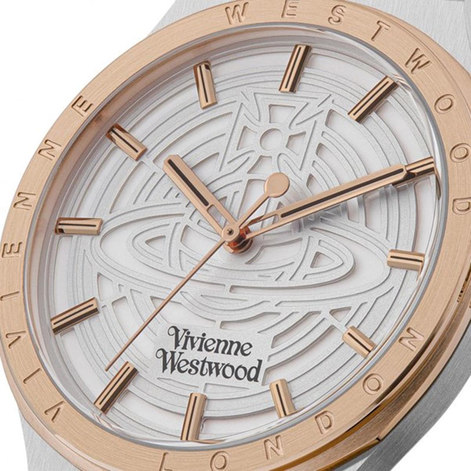 Close-up of Vivienne Westwood ELTHAM watch dial with white face and rose gold hour markers