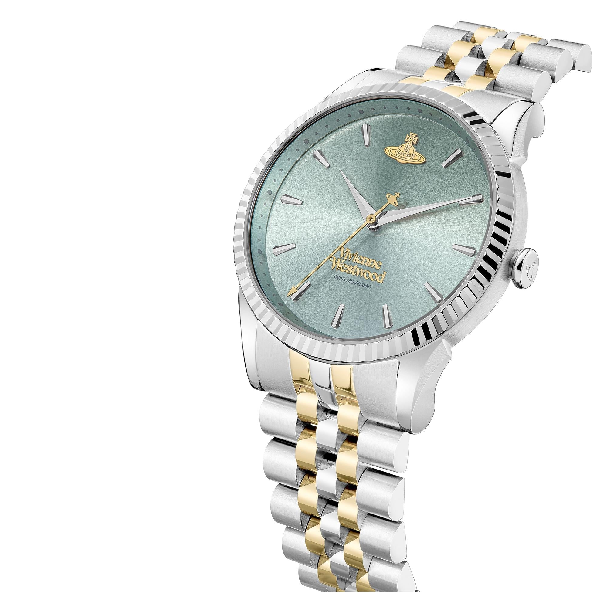 Vivienne Westwood Orb Pop watch at angle showing pale green dial, fluted bezel, and two-tone bracelet