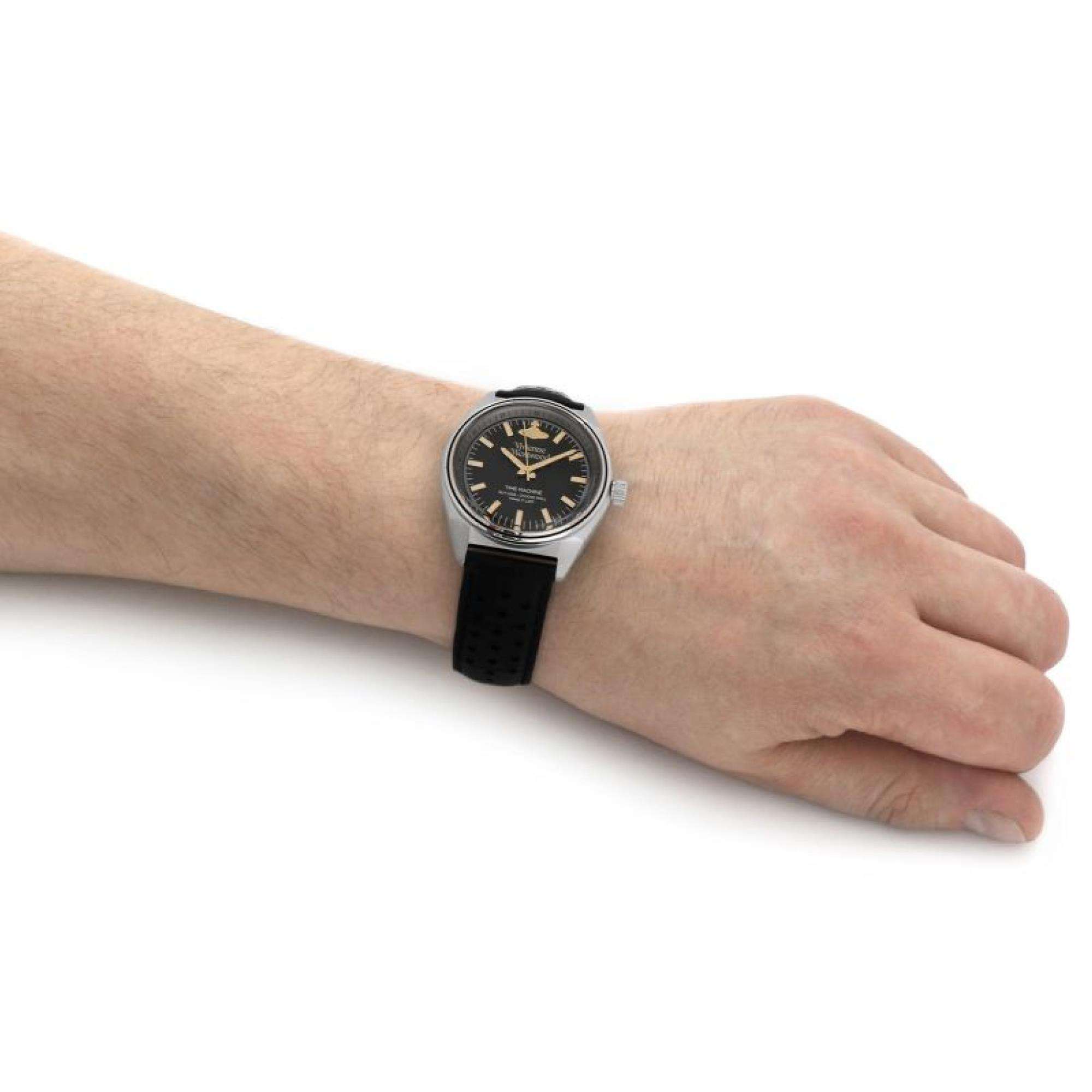 SYDENHAM men's watch on wrist showing silver case and black dial with gold markers