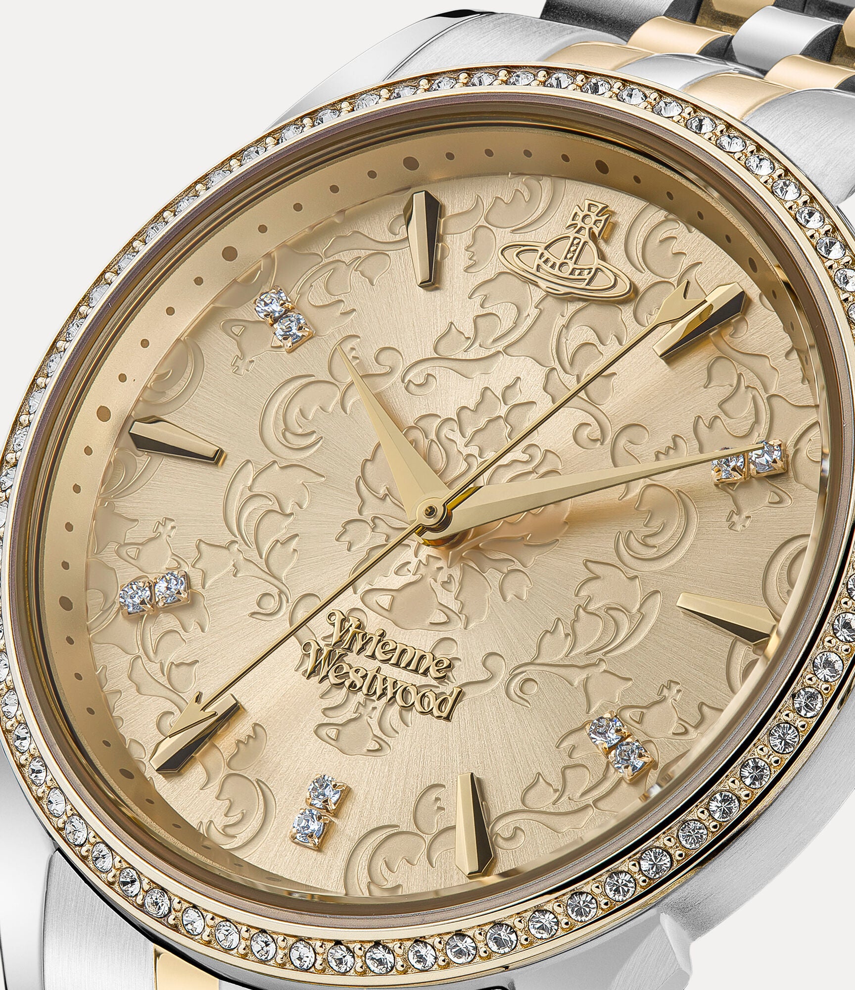 Vivienne Westwood VV208CPSG dial detail showing champagne face with crystal hour markers