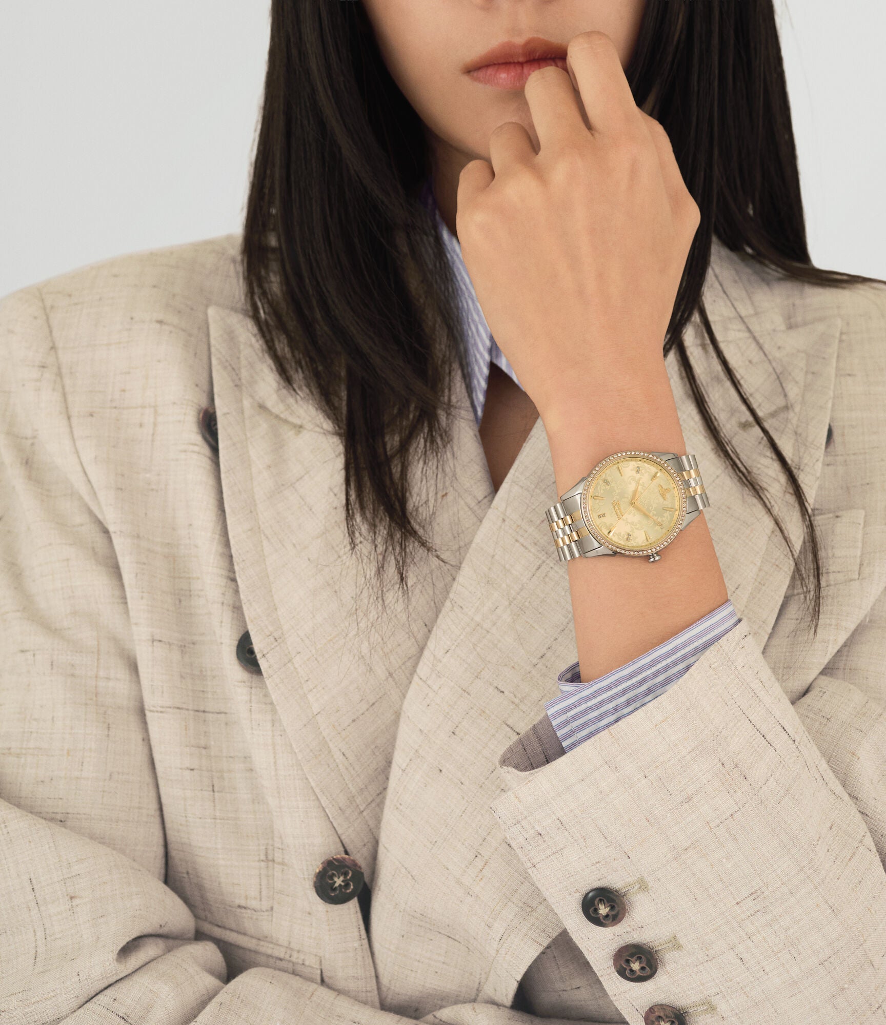 Close-up of Vivienne Westwood VV208CPSG watch worn on woman's wrist