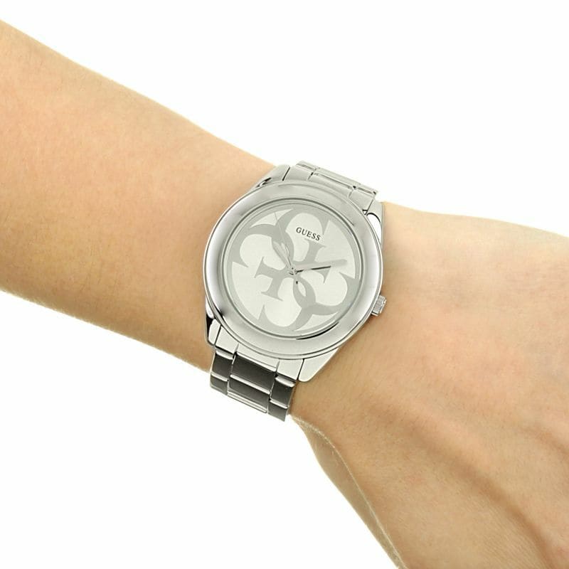 GUESS G-TWIST silver watch worn on wrist showing fit and G-logo dial design