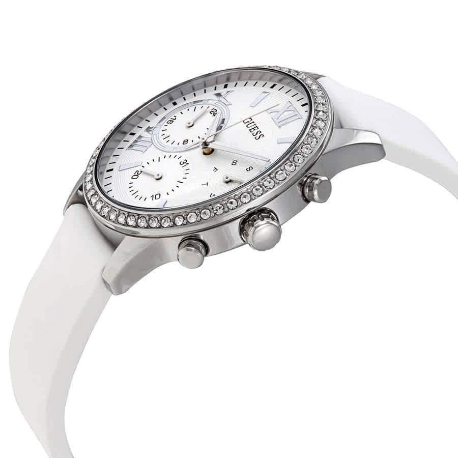 Guess W1135L7 solar ladies watch worn on wrist showing white silicone strap