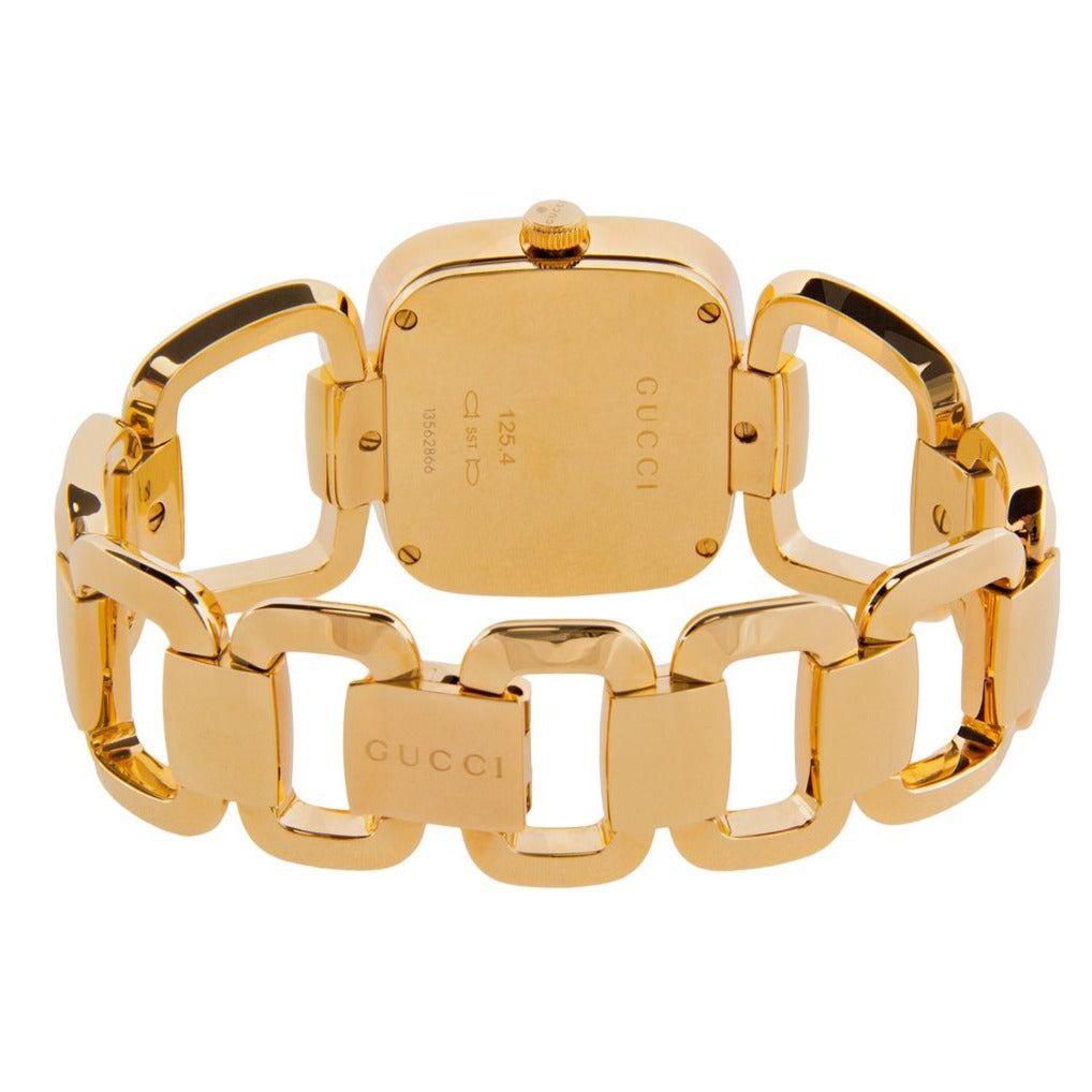 Gucci YA125408 watch caseback with engraved text and gold bracelet visible