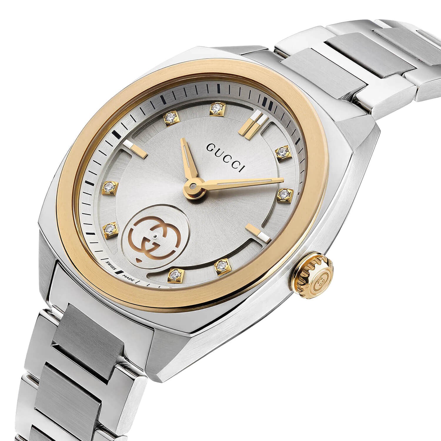 Close-up of silver dial with gold-tone hands, diamond indices, and interlocking GG logo subdial