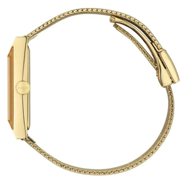 Gucci G-Frame yellow gold watch with mesh strap shown on wrist