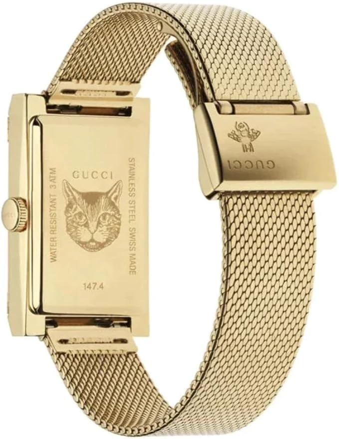 Gucci G-Frame yellow gold watch with mesh strap and cat emblem on case side view